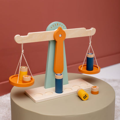 Wooden scale with 6 weights