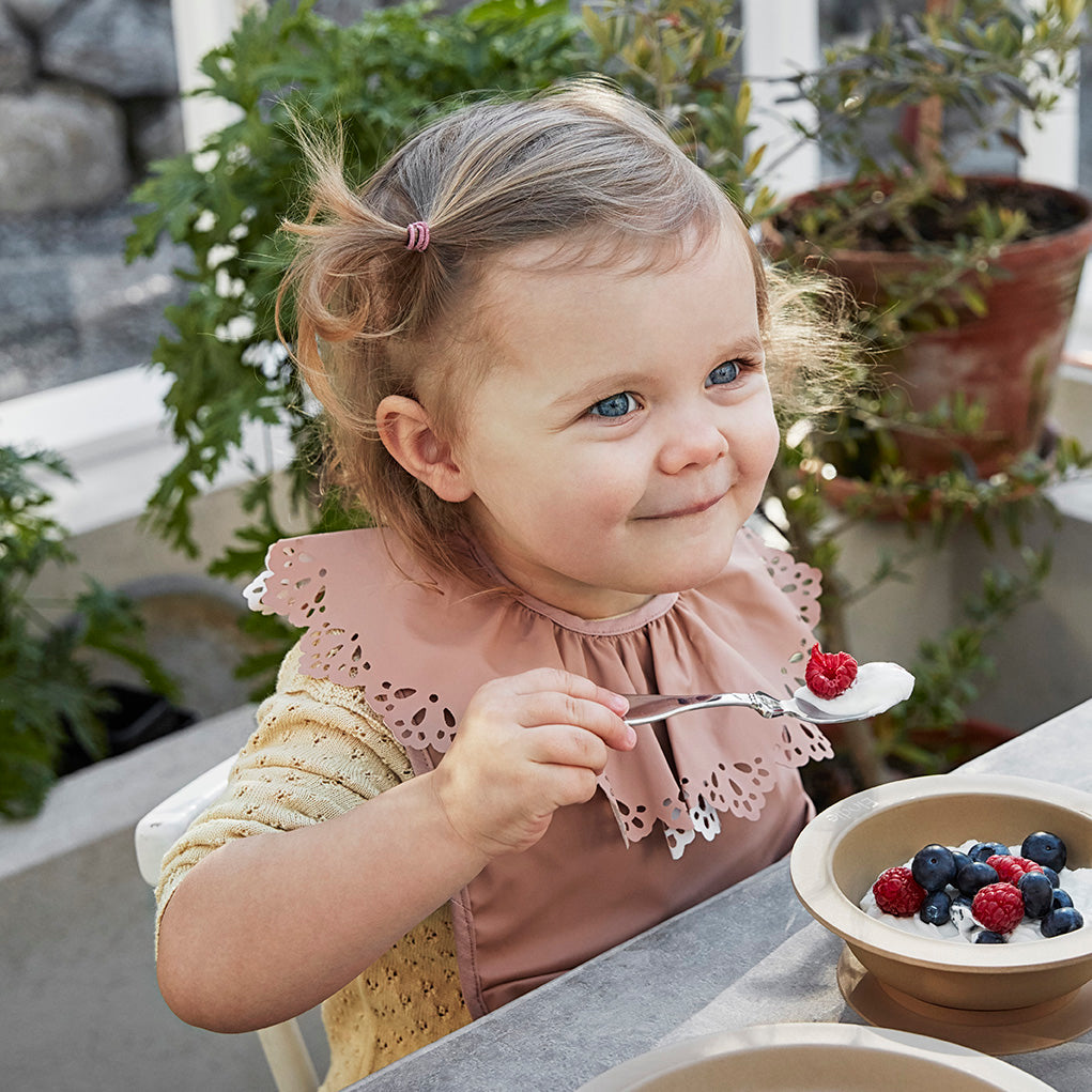 Baby with bib shop